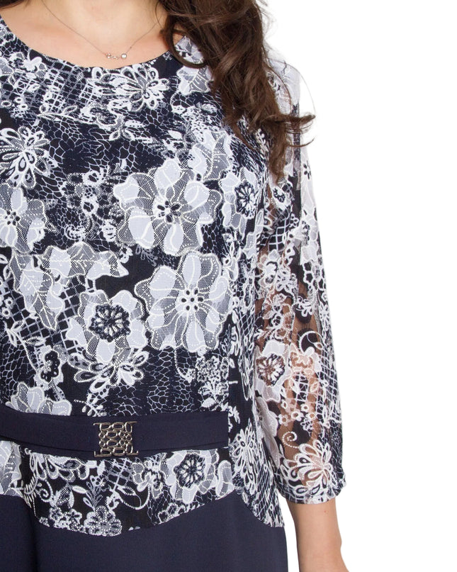 Елегантна тъмносиня рокля с флорален десен в големи размери