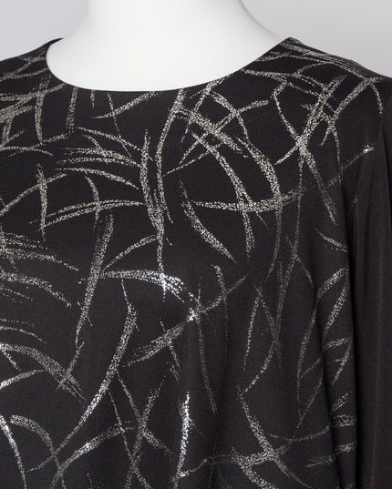 Елегантна туника с лъскав сребрист десен и разкроена кройка