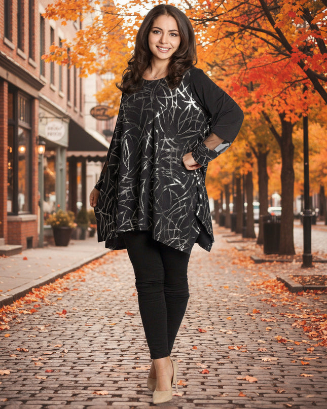 Елегантна туника с лъскав сребрист десен и разкроена кройка