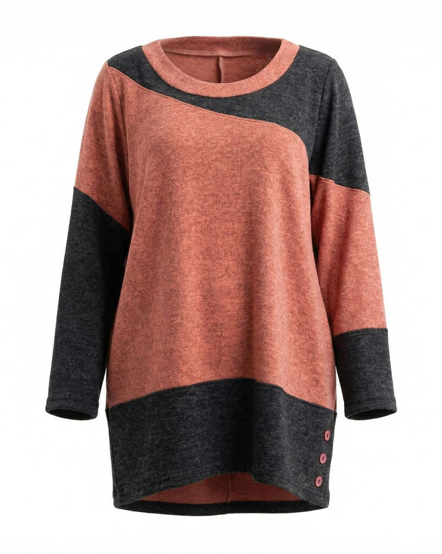 Асиметрична зимна туника в корал и графит, преден изглед на бял фон с видимо разположение на цветните панели и декоративни копчета.