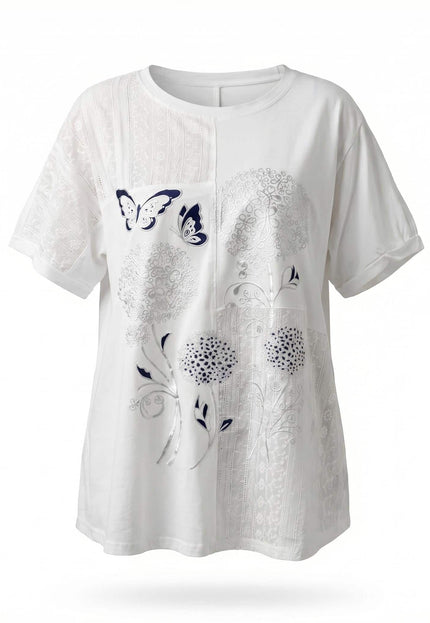Бяла лятна памучна туника големи размери с флорална апликация, пеперуди и дантела, заснета отпред на бял фон.