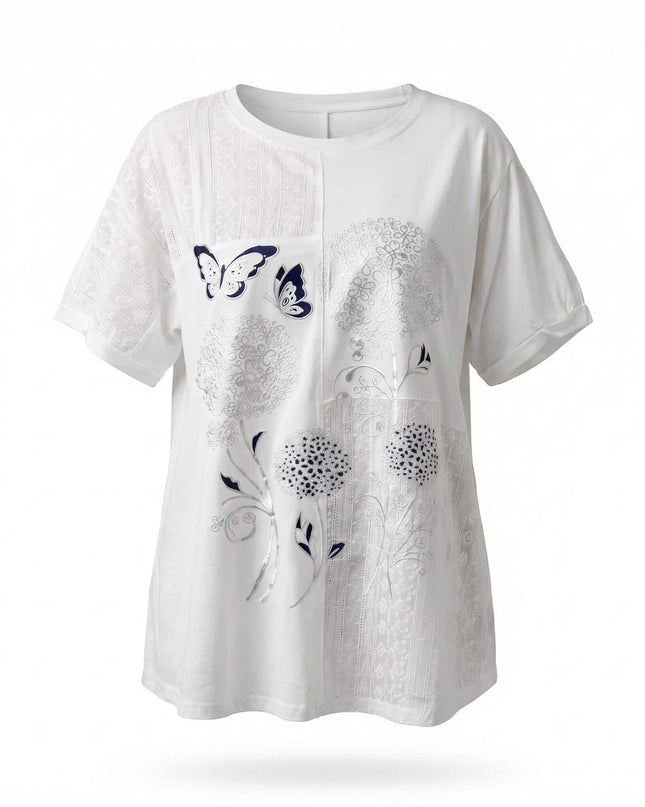 Бяла лятна памучна туника големи размери с флорална апликация, пеперуди и дантела, заснета отпред на бял фон.