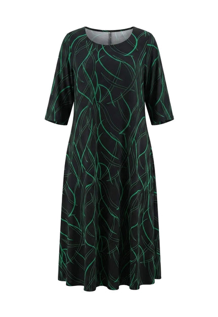 Дълга официална макси рокля с къс ръкав в черно със зелен абстрактен принт, плосък кадър на бял фон.