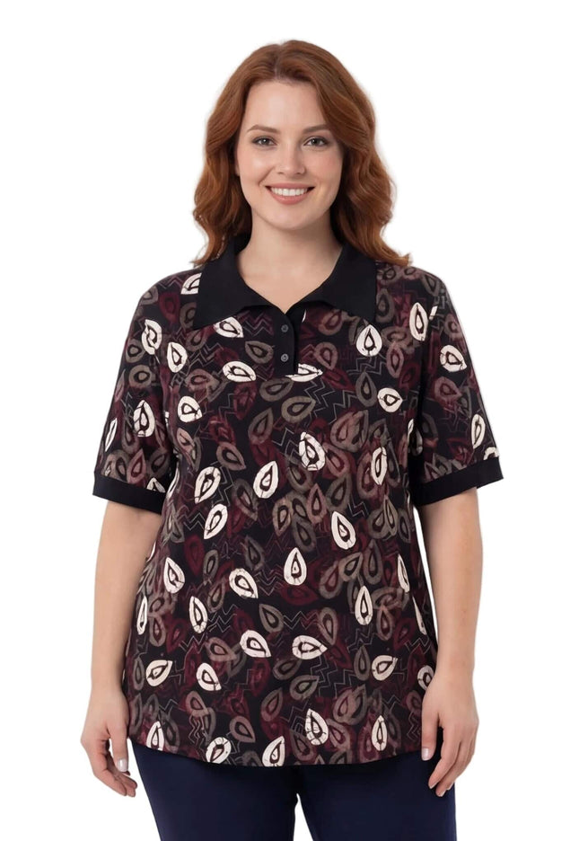 Дамска официална туника на черен фон с десен на листа, представена на бял фон.