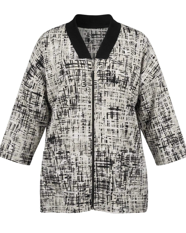 Дамски бежов макси жакет с абстрактен десен и предно закопчаване с цип, представен на бял фон.