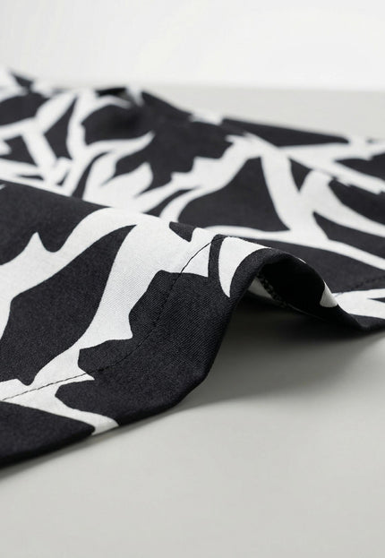 Елегантно дамско макси сако в черно и бяло без закопчаване