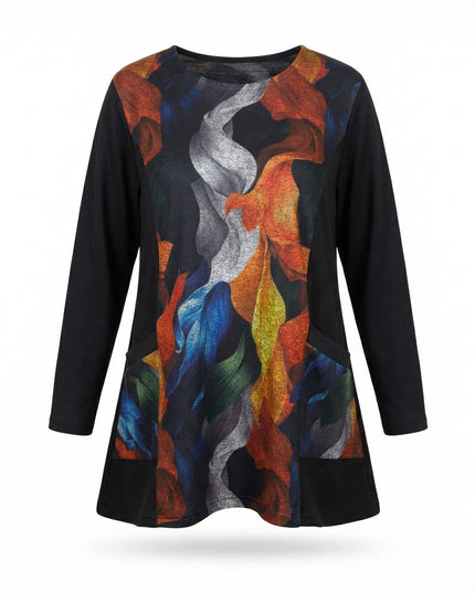 Елегантна дамска туника в черно с цветен абстрактен принт есенни листа, дълъг ръкав и функционални джобове, заснета отпред на бял фон.
