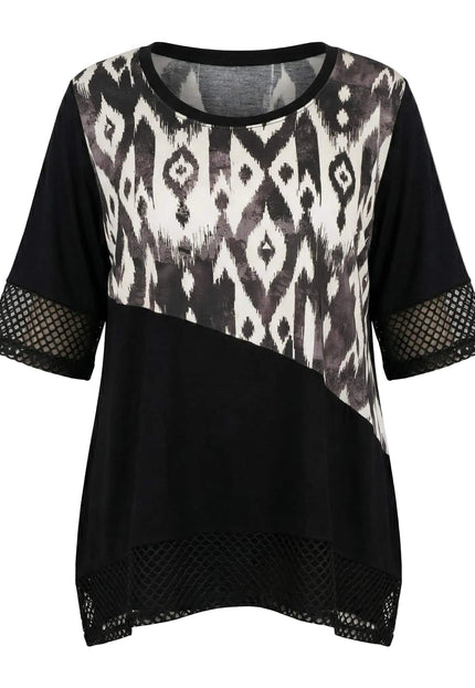 Официална черна макси туника с ефектен абстрактен принт, мрежа по ръкавите и асиметричен подгъв на бял фон.