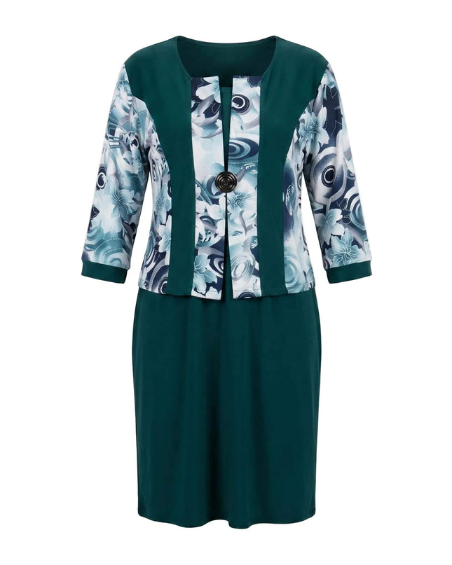 Официална масленозелена рокля с флорални мотиви, 3/4 ръкави и декоративна брошка, заснета отпред на бял фон.