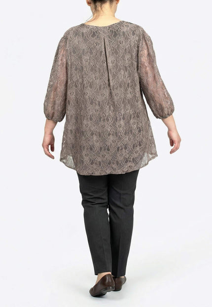 Официална разкроена туника с дантелен десен, представена в гръб за детайлен преглед на свободната кройка.