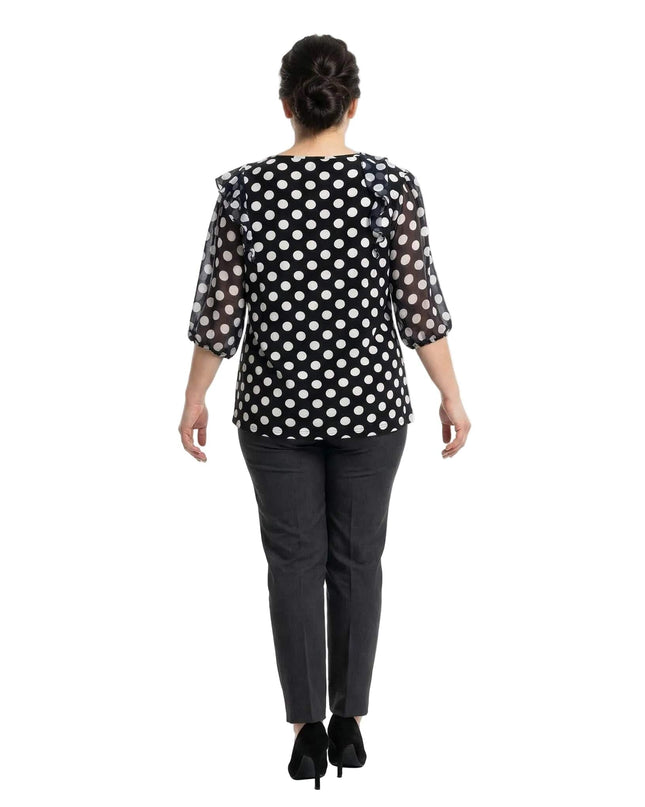 Официална тъмносиня туника на бели точки с ефирни шифонени 3/4 ръкави, изглед отзад в цял ръст на бял фон.