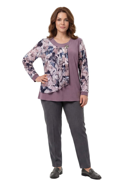 Официална разкроена туника в цвят пепел от рози с асиметричен флорален шифон и брошка, заснета в цял ръст.