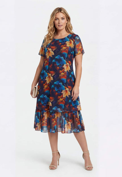 Официална тъмносиня макси рокля от шифон с многоцветен принт на листа, представена върху модел в цял ръст на бял фон.