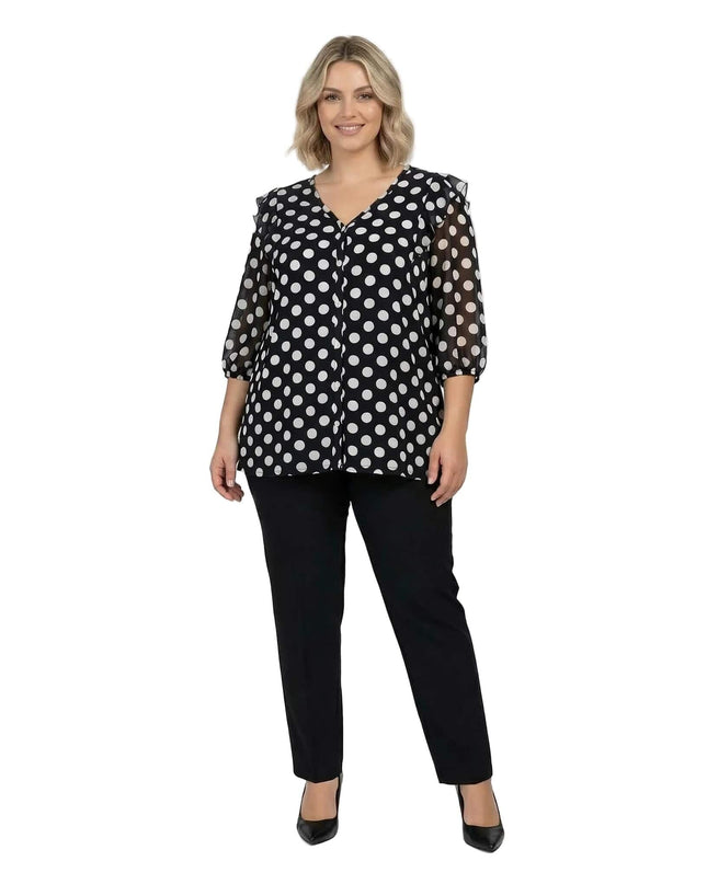 Дамска официална тъмносиня туника на бели точки с 3/4 ръкави и V-образно деколте, представена в цял ръст на бял фон.